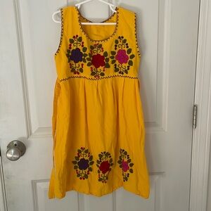 Yellow Sleeveless Dress with Flower Patterns